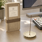 Second Wind incense box with scent label standing on an afternoon work desk with keyboard and green tea